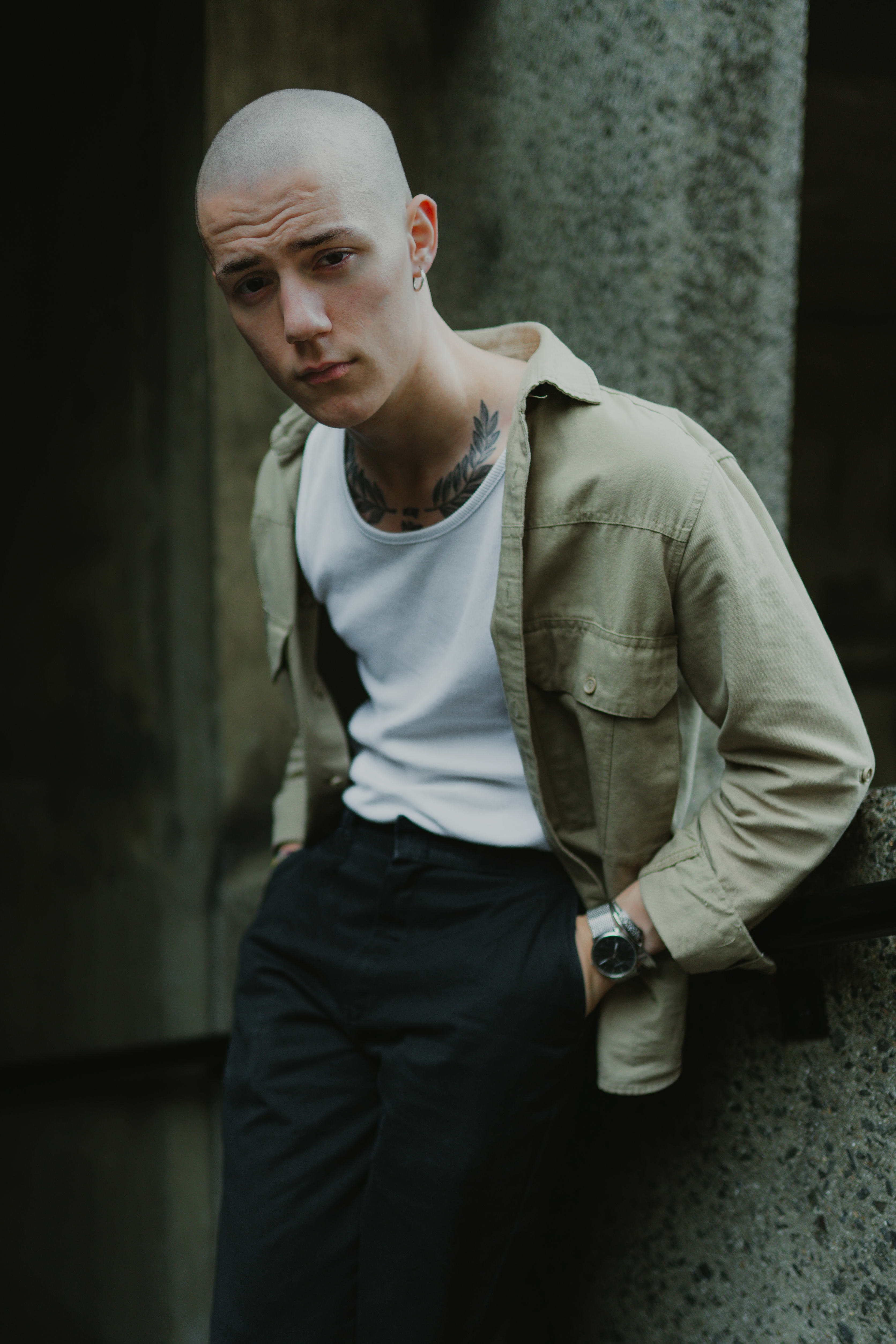 Portrait of a guy on a white and beige shirt