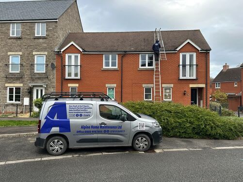 Alpine Home Maintenance Ltd roofer working on a tiled roof in West Wick, Weston-super-Mare, with the company van outside