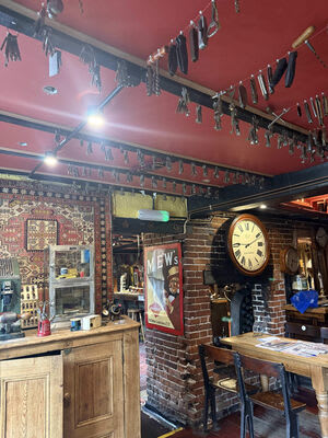 Spotlights and an emergency-light fitting within the decorated interior.