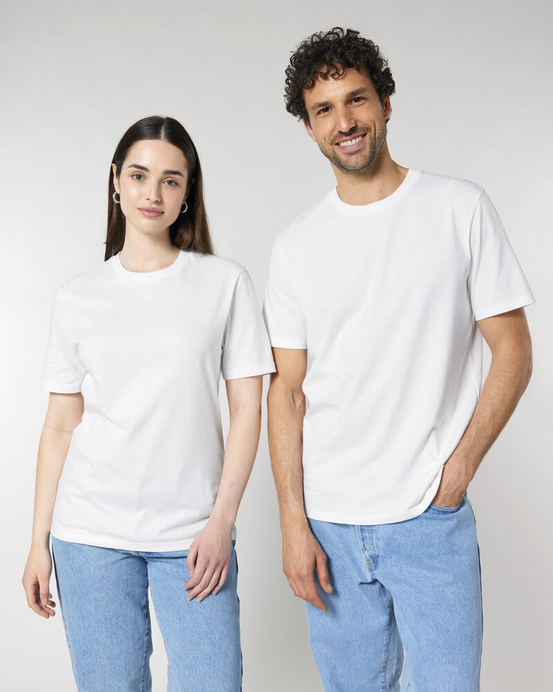 Male and female models in unisex Stanley/Stella ‘Creator 2.0’ white eco t-shirts and blue jeans, ideal for eco printing and sustainable fashion.