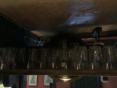 Existing cable routes above the bar, before the rewire.