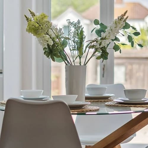 Staged dining room for a home in Kent by Farrow Home Staging
