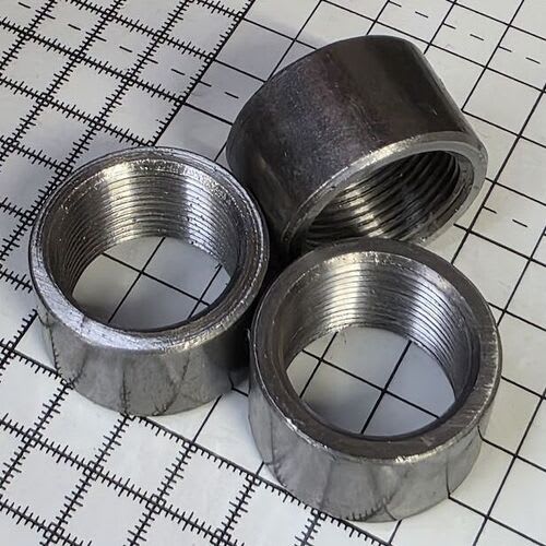 Round internally threaded nuts