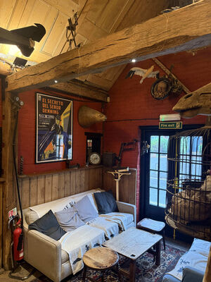 Lighting and surface-mounted cable routes around the existing timbers.