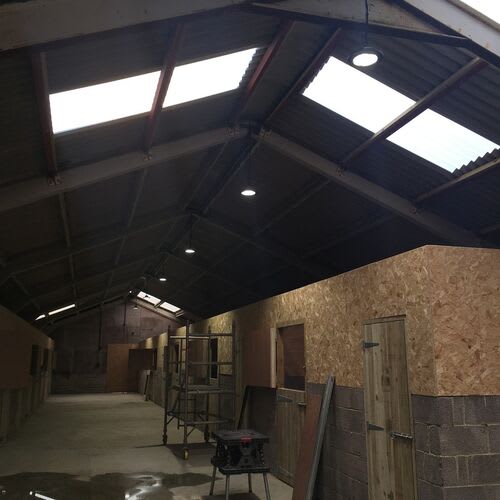 Energy-efficient equestrian arena lighting setup by certified electricians.\r\n