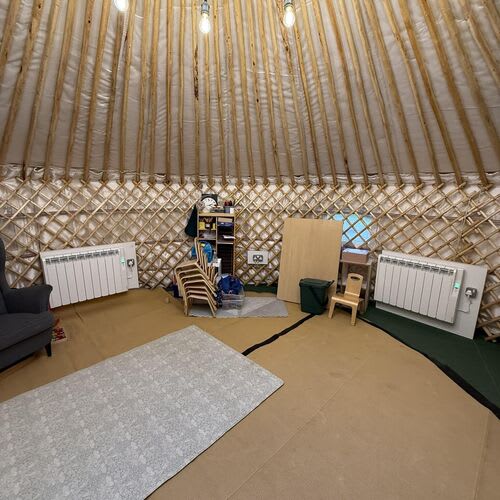 Exterior of yurt with power supply connections.

