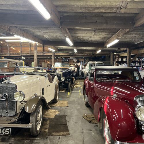 Chase Farm Electrical team installing workshop lighting