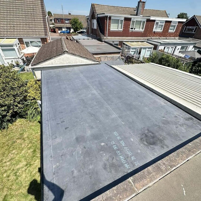 alpine home and garden improvements team members repairing roof near clifton bristol