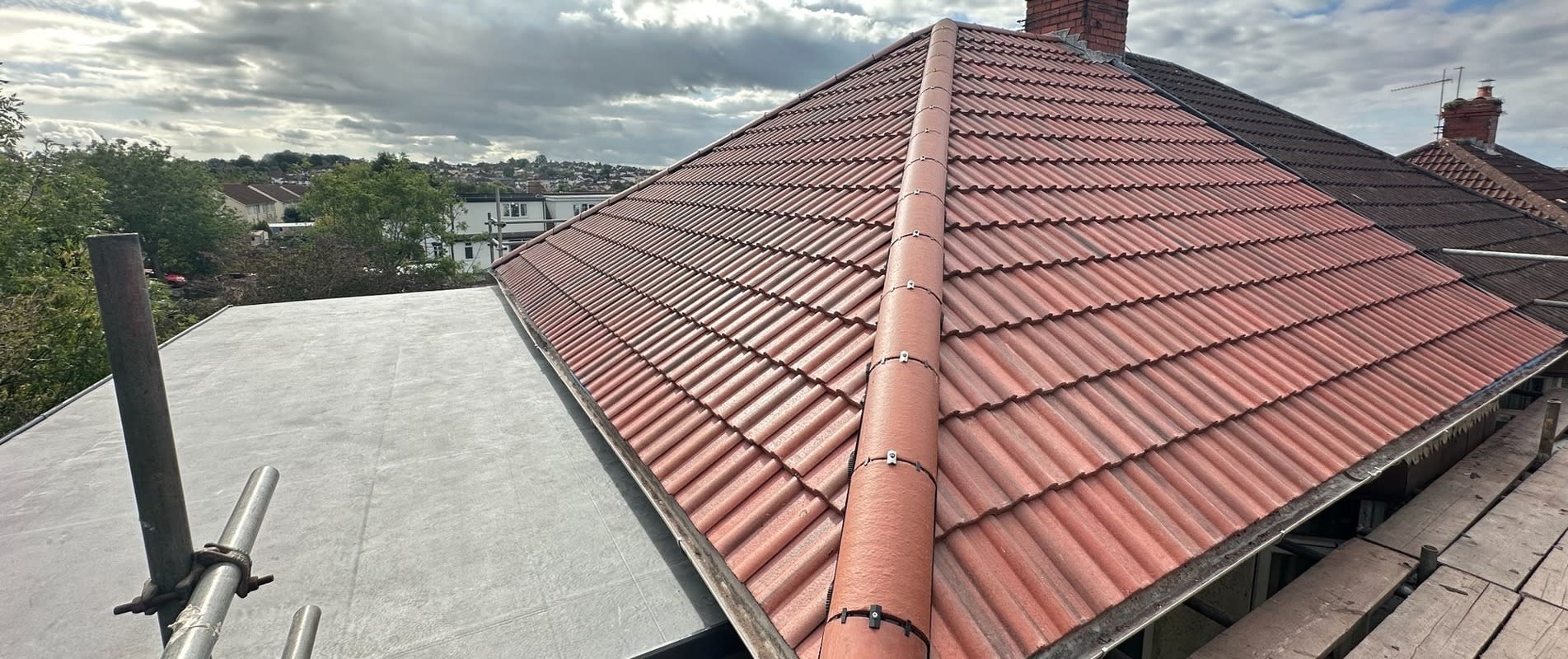 Completed tiled roof replacement and EPDM flat roof by Alpine Home Maintenance Ltd in Southmead, Bristol