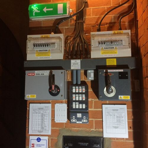 Chase Farm Electrical performing quinquennial fixed wiring testing at a church in Hampshire and displaying their safety compliance sticker