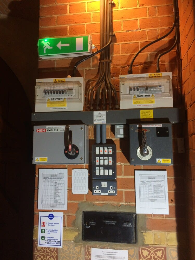 Qualified electrician conducting an Electrical Installation Condition Report (EICR) inspection to ensure safety and compliance in a residential property.