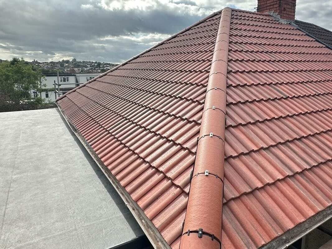 Completed tiled roof and EPDM flat roof by Alpine Home Maintenance Ltd in Southmead, Bristol