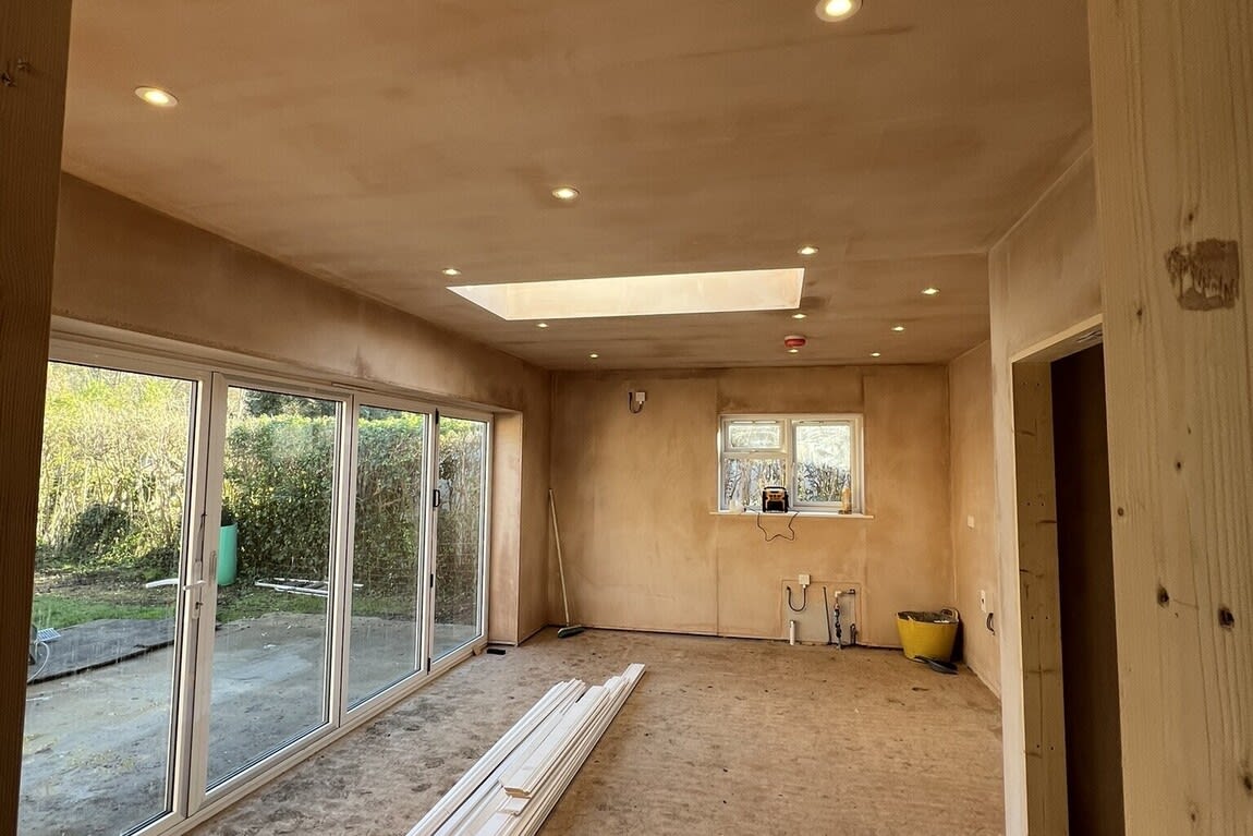 Professional electrician rewiring a house - Chase Farm Electrical