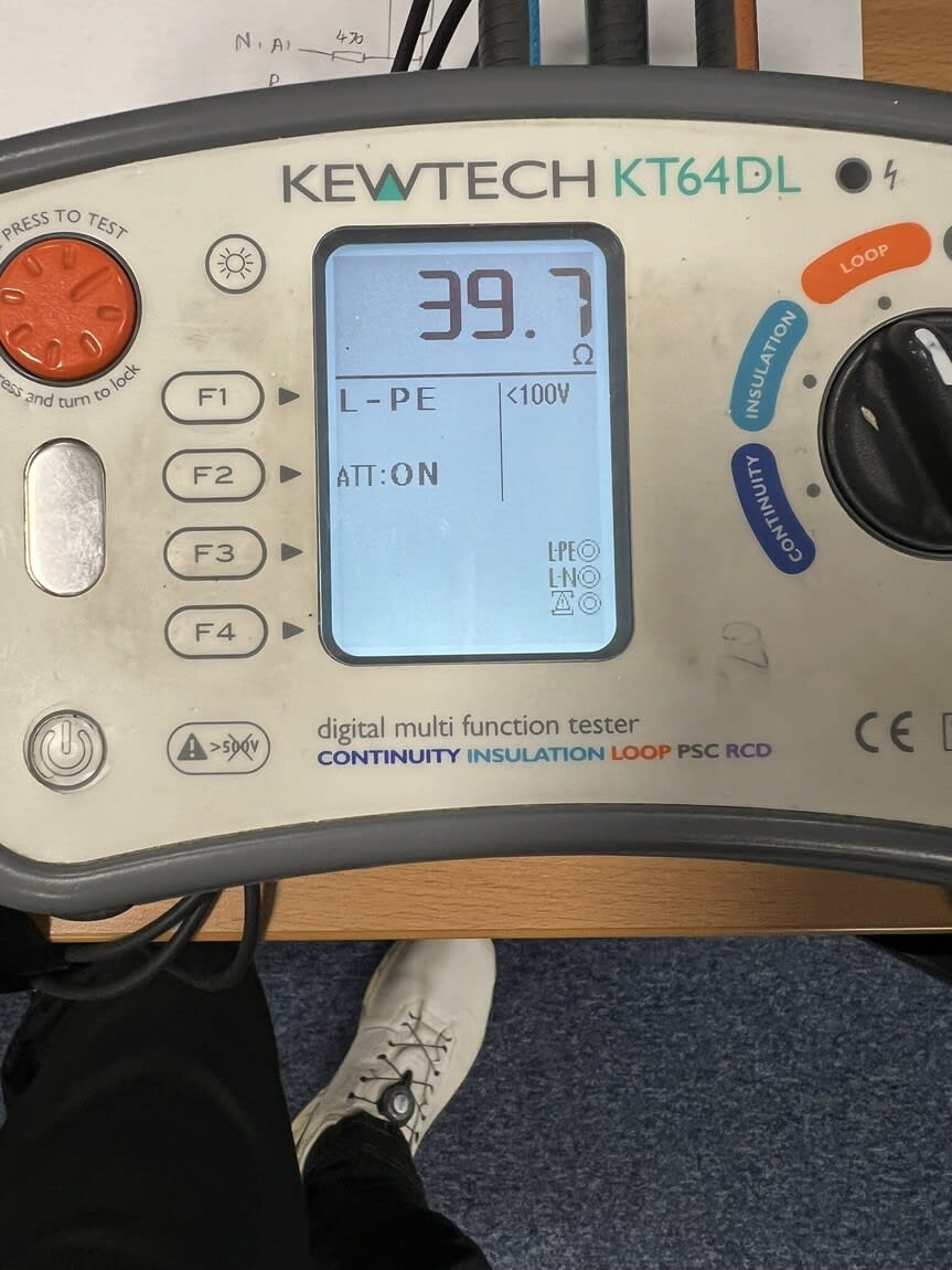 Electrician carrying out an EICR check in a Southampton office