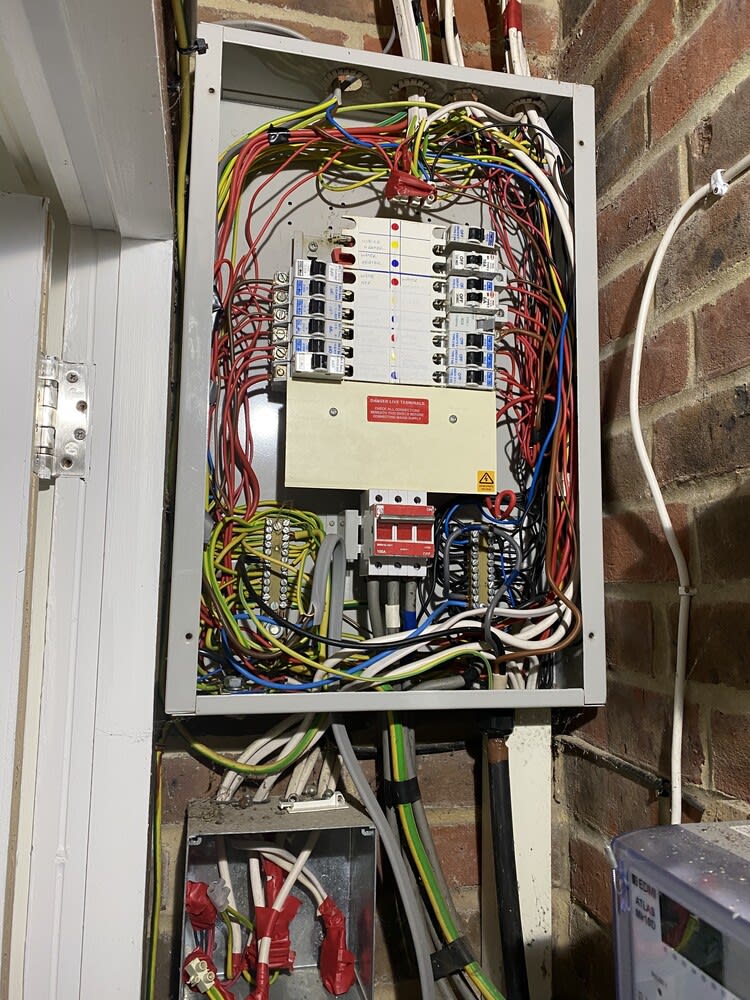 Electrician performing a commercial EICR inspection in Hampshire