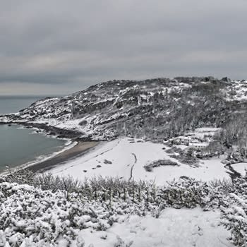 Snow At Pwlldu Bay