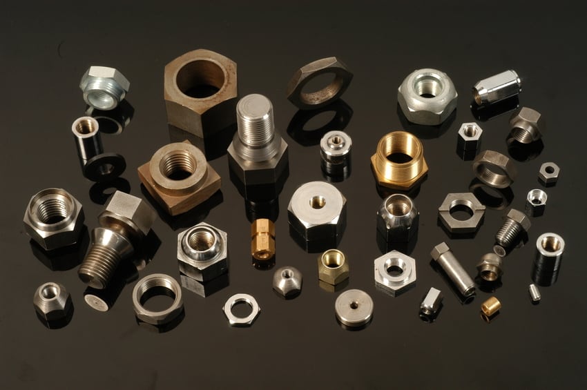 A selection of hex, square and round nuts in various materials which are all manufactured by Trojan Special Fasteners Ltd