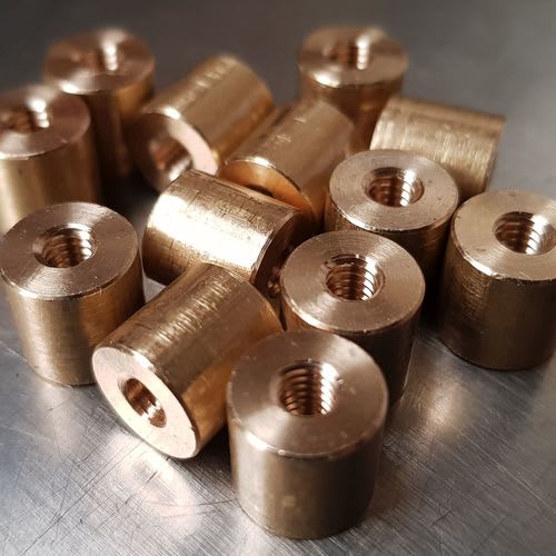 Round internally threaded nuts