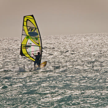 Yellow wind surfer