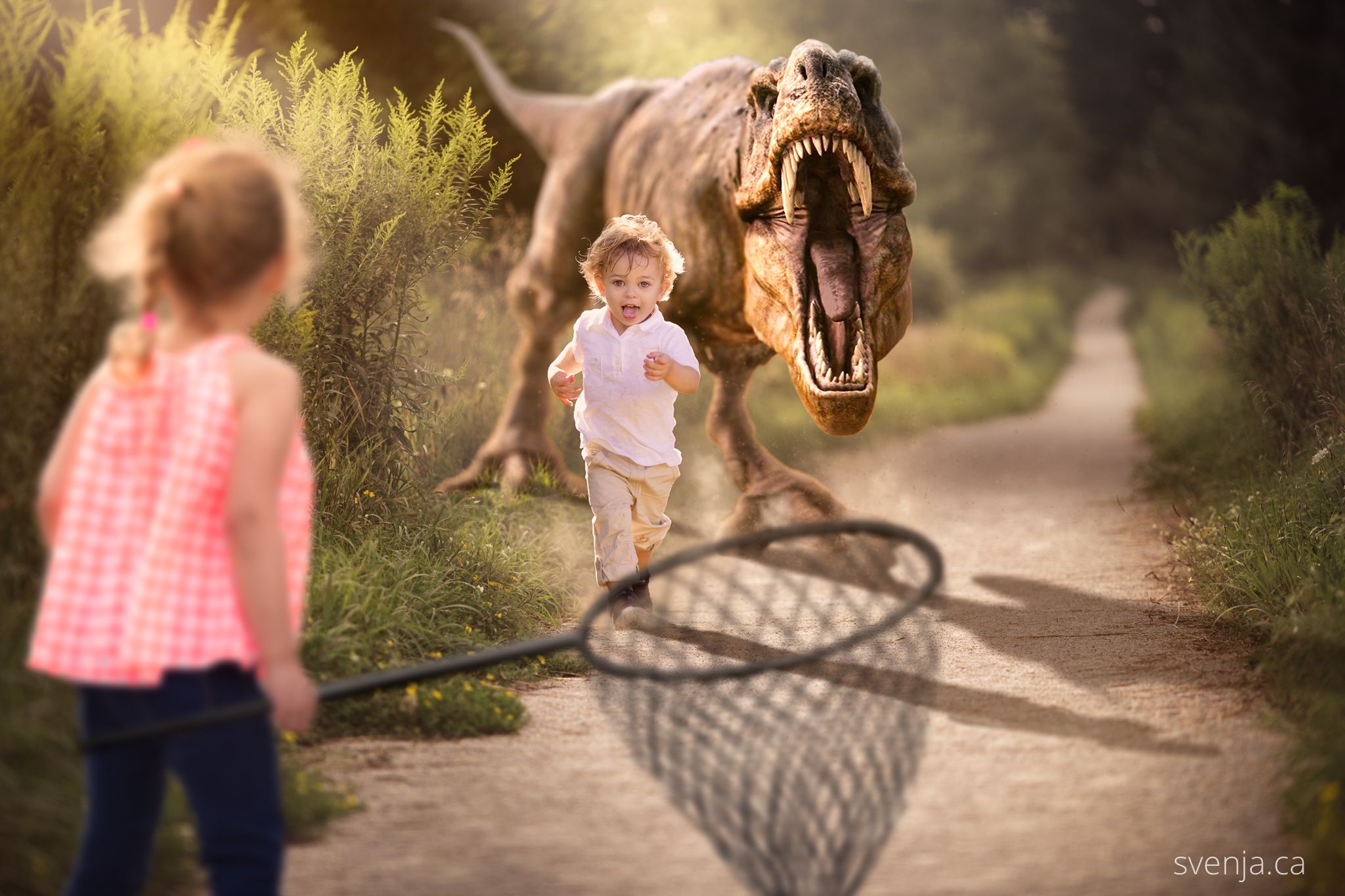 boy running from a dinosaur and girl with a net to save him