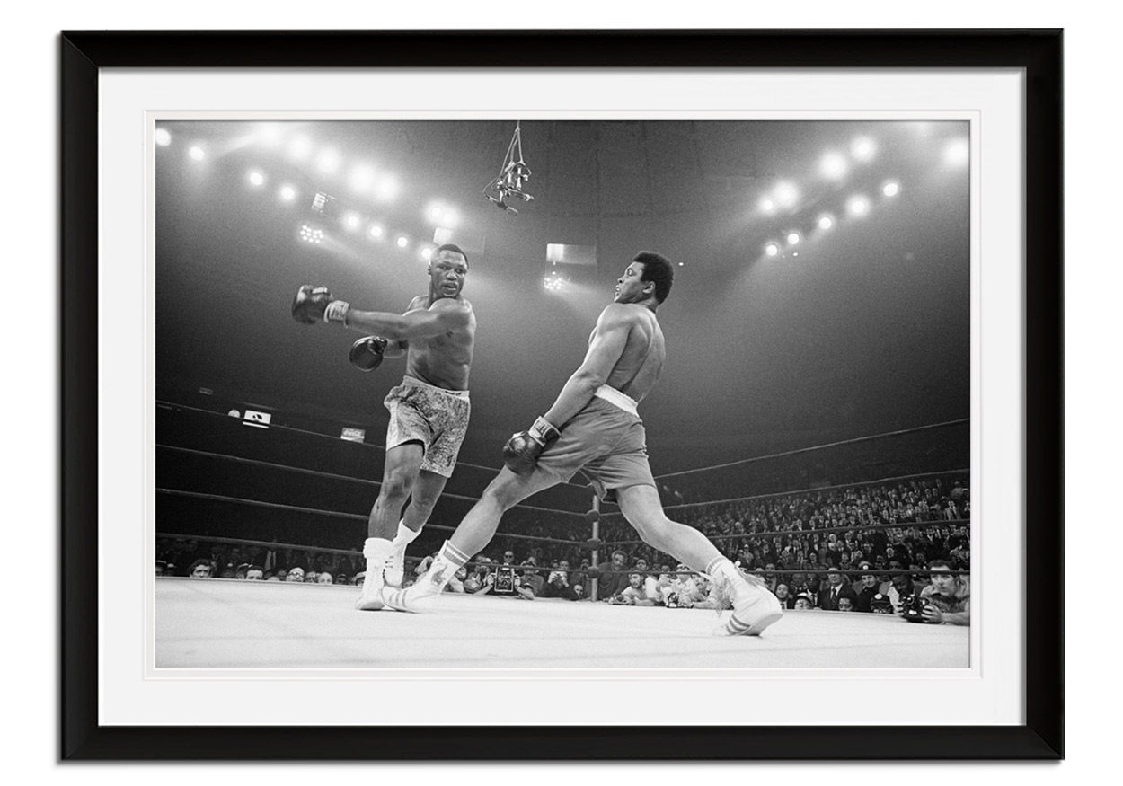 Ali avoids Fraziers punch by 