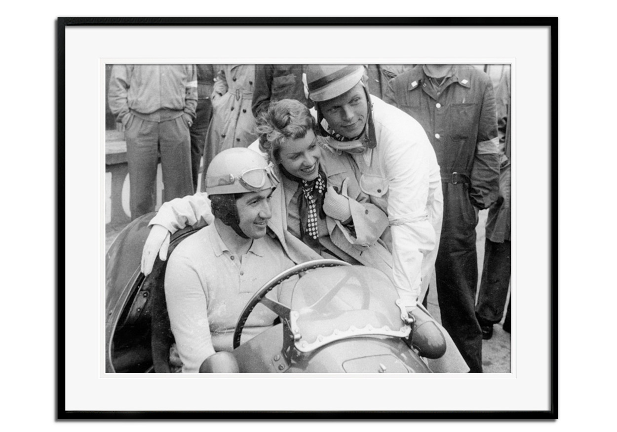 Alberto Ascari in a Ferrari by 