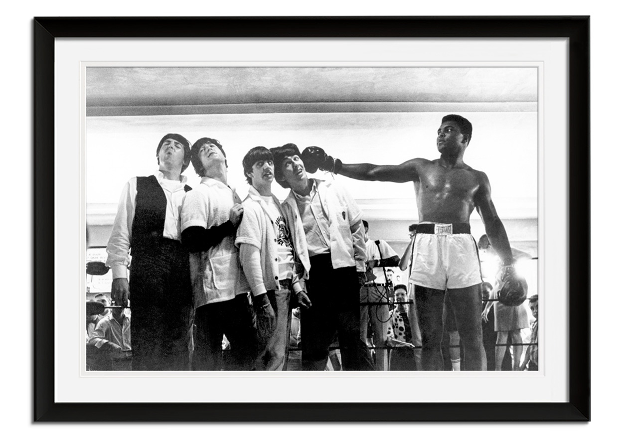 The Beatles pose with Ali by 