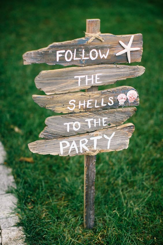 trouwen-aan-het-water-strand-decoratie-wegwijzer