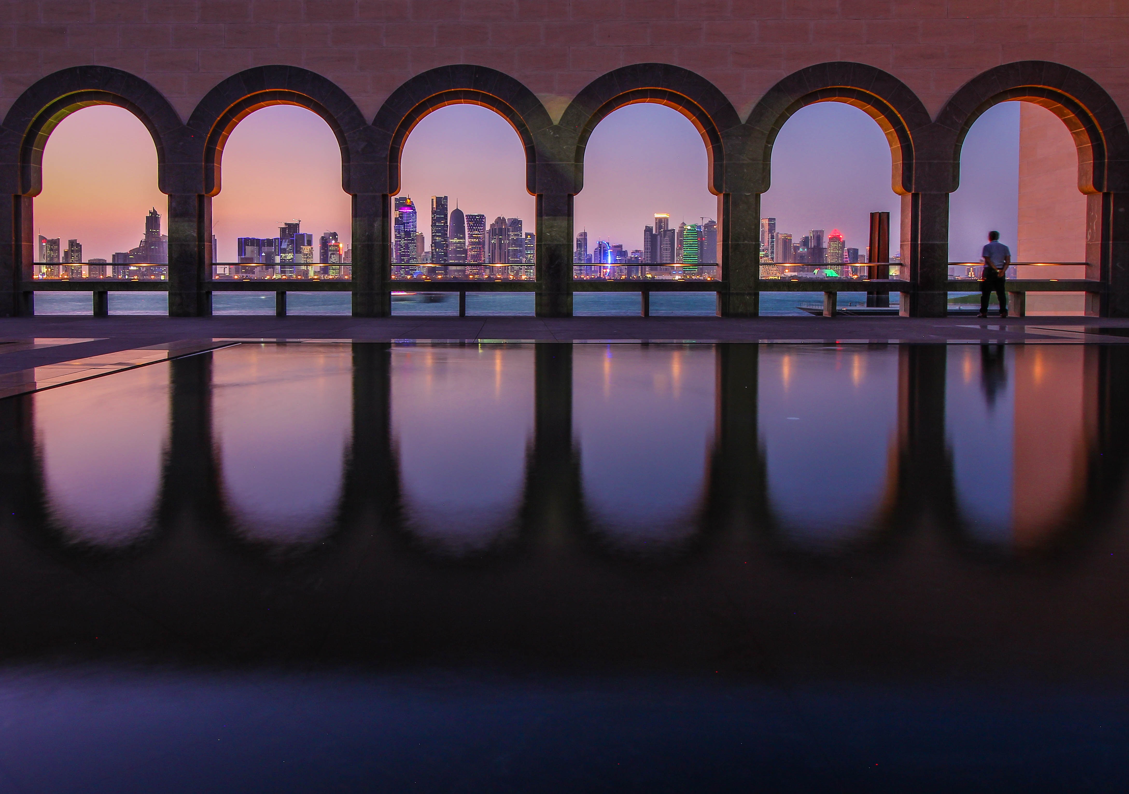 Watch the skyline of Doha light up from the Museum of Islamic Art.