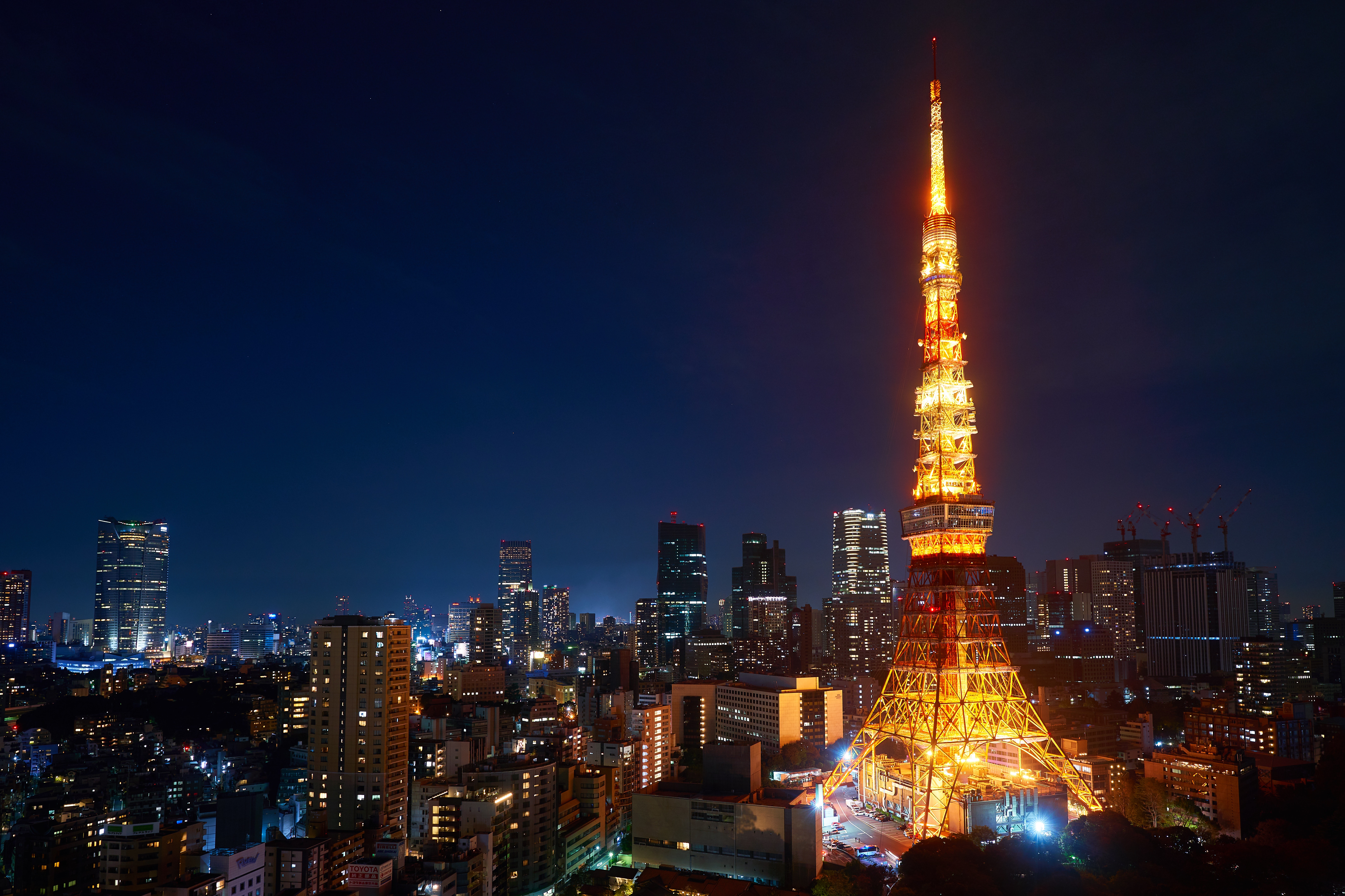 The Tokyo Tower lighting up the night sky of the city