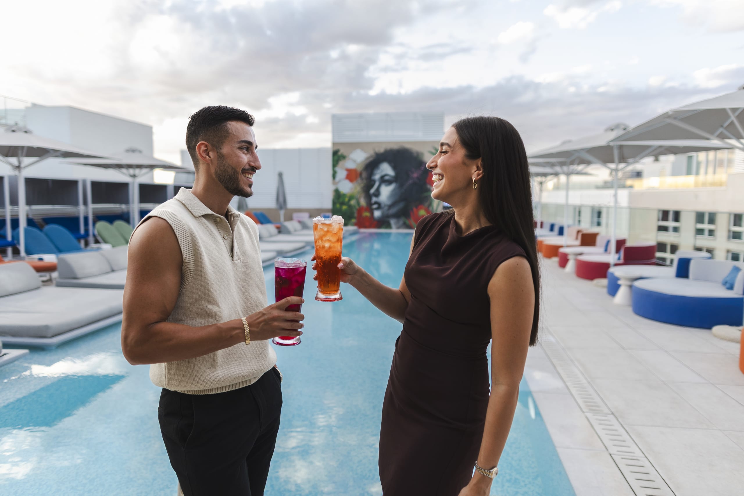 Couple Cheersing With Drinks