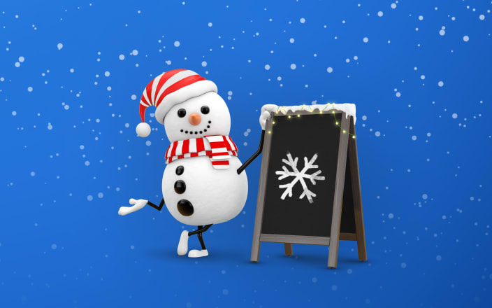 A snowman next to a chalkboard with a snowflake drawn on it for Confetti's Virtual Holiday Pictionary