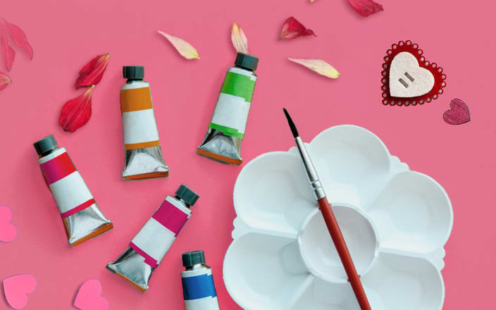 Materials for a Valentine's Day painting class, including paints, palette, and paintbrush (preview)