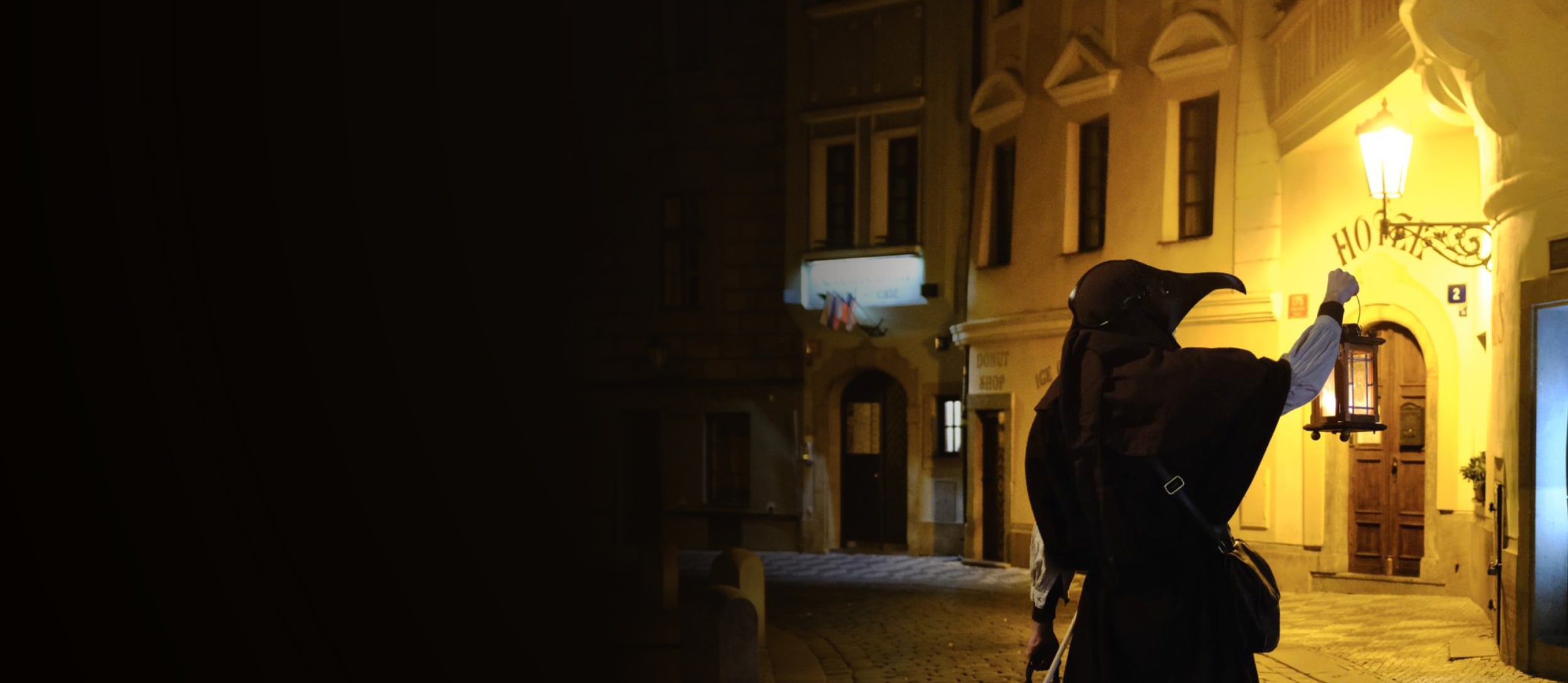 Plague doctor wearing mask in the streets of Prague (large)