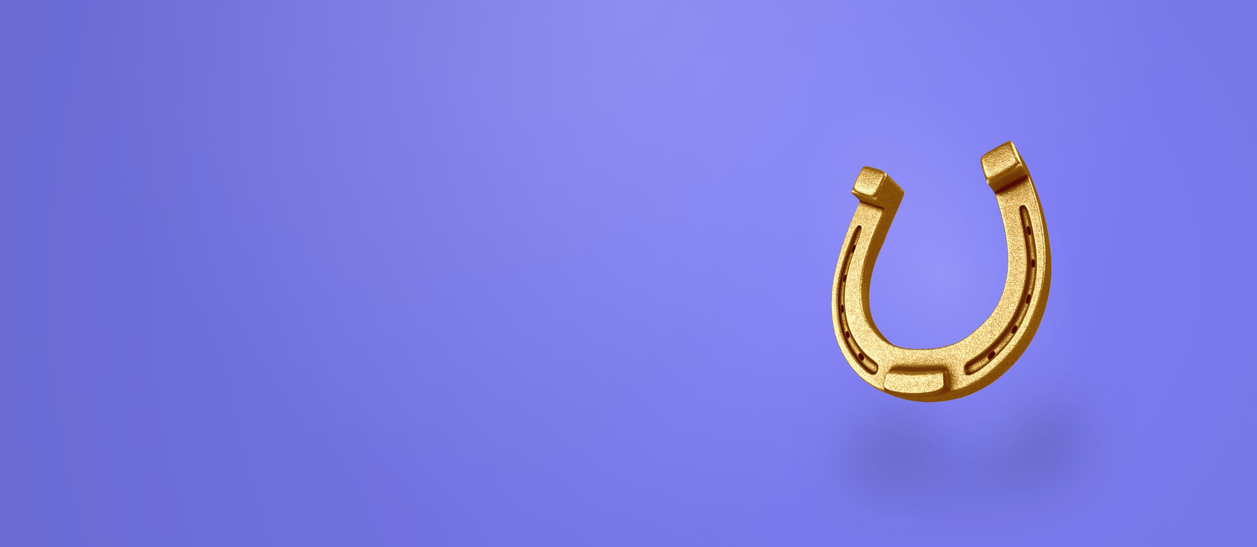 Large gold horseshoe against a purple background (large)