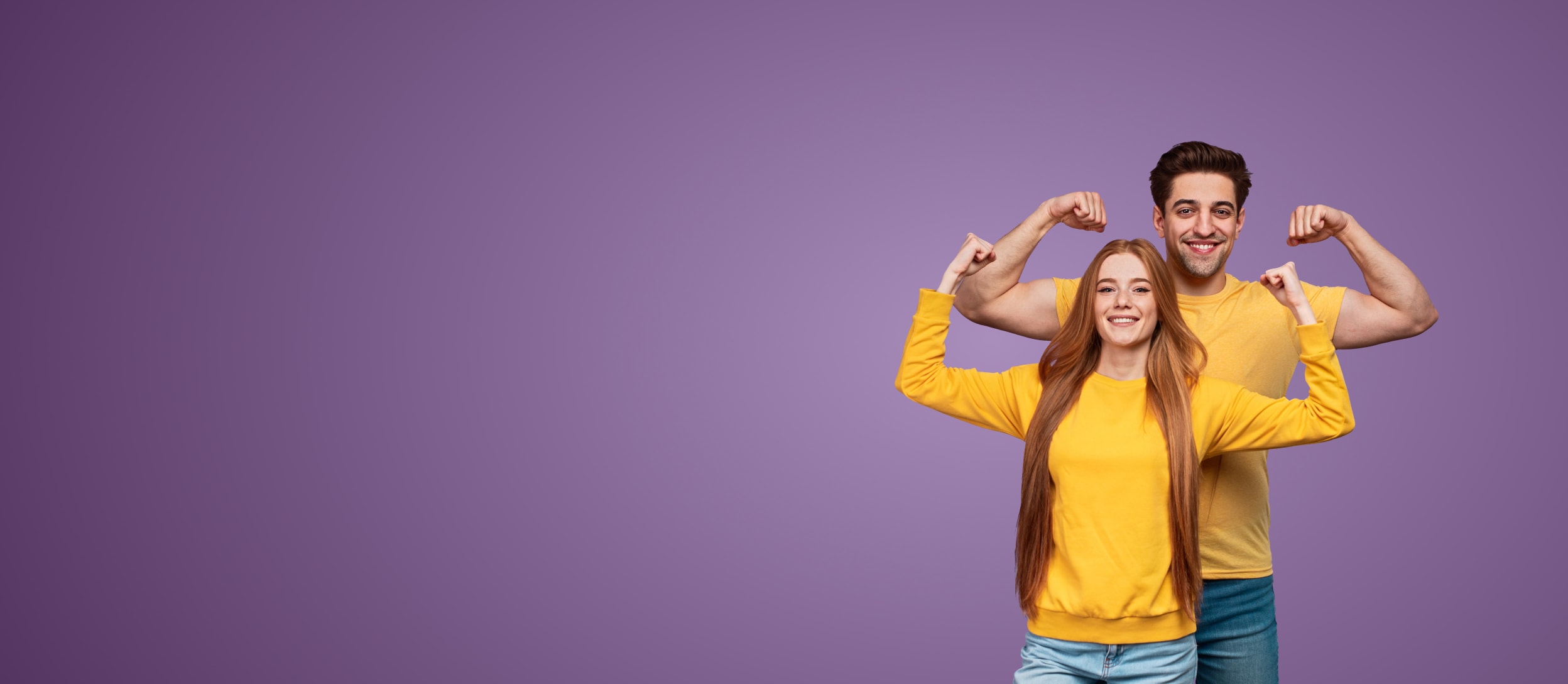 Young man and a woman in a strong pose (large)