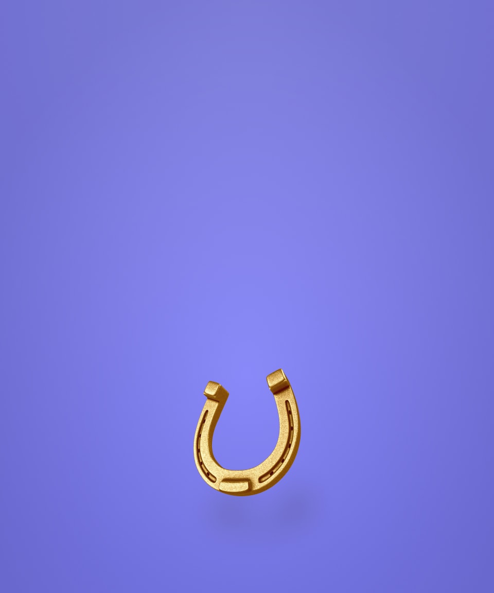 Large gold horseshoe against a purple background (small)