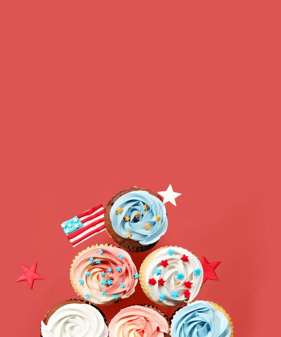 Patriotic cupcakes with red, white, and blue frosting and star shaped sprinkles for Confetti's Virtual July 4th Cupcake Decorating 