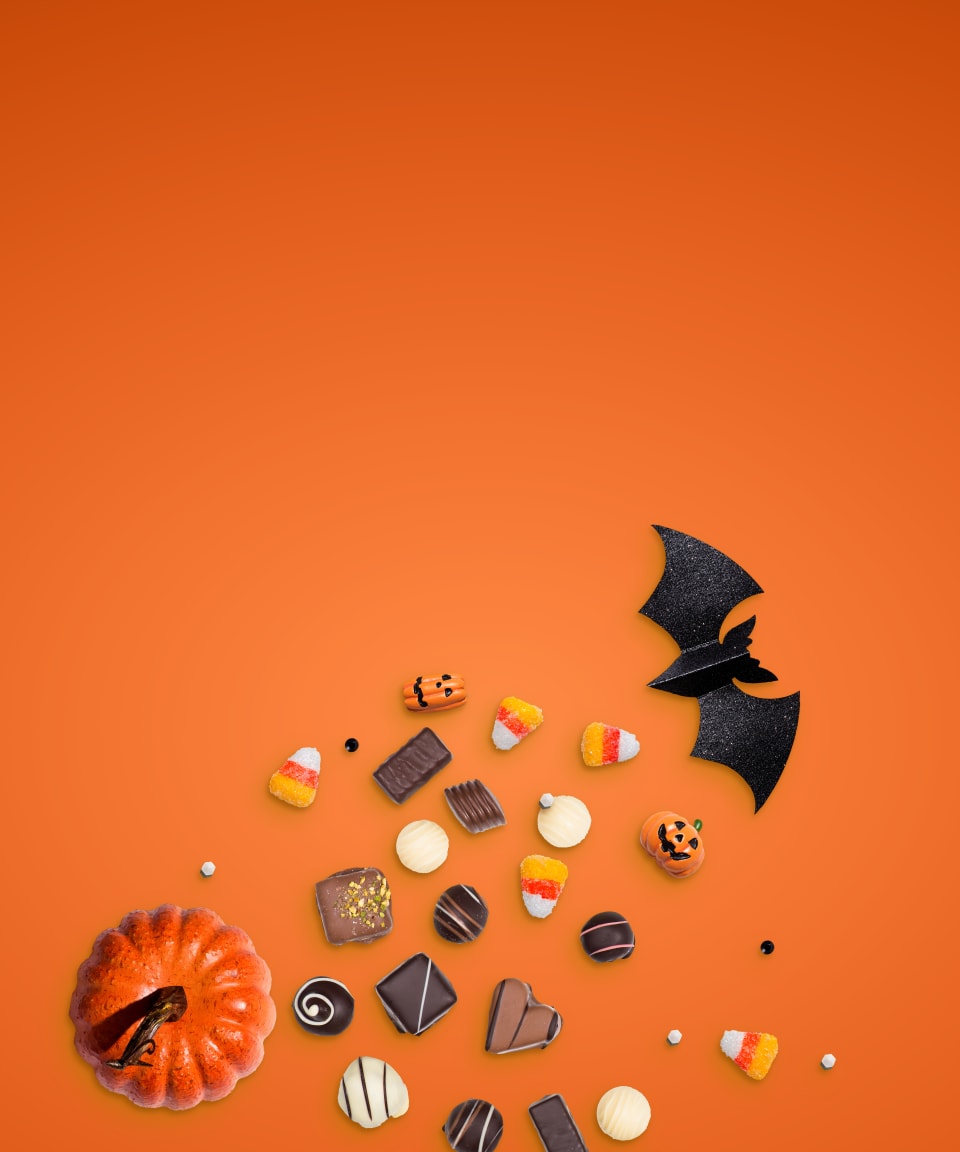 Assortment of chocolates and Halloween decorations (small)