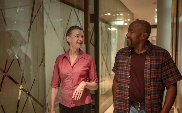 Patient and doctor in corridor