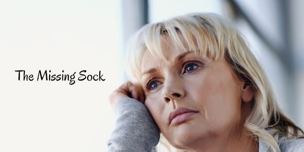 The Missing Sock I dropped a laundry basket of clean clothes near my