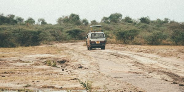 Laura's Welcome We jostled and rattled in the car barreling down the dirt