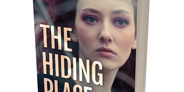 The Hiding Place Prologue The tall blades of grass whipped against my legs