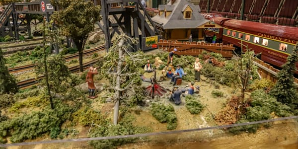 Manuscripts are to trainsets, as. . .  Trick question. Manuscripts are