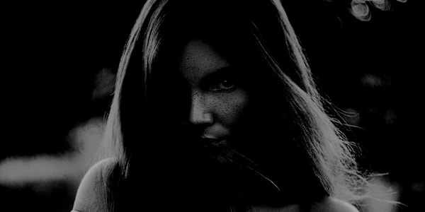 The Gesture That Gave Her Away Glaring from the end of the aisle, eyes made