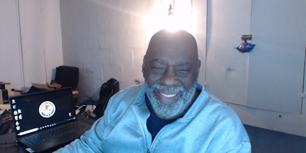 The Black Man's Burden In this land of freedom's boast, A shadow lingers, a