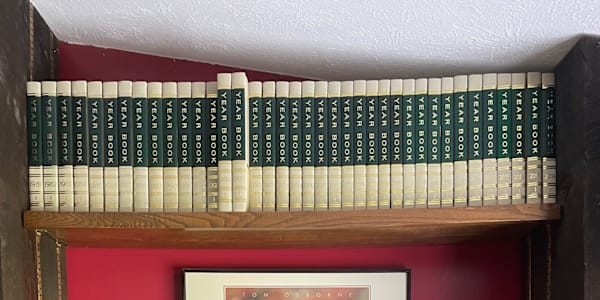 Encyclopedia Year Books and Go Big Red! Pictured above (on the top shelf in