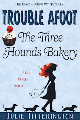 Trouble Afoot At The Three Hounds Bakery: A Cozy Murder Mystery (The Doxies & Donuts Mystery Series Book 1)