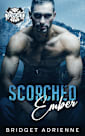Scorched Ember: A Forced Proximity Holiday Romance (Scorched Legacy)