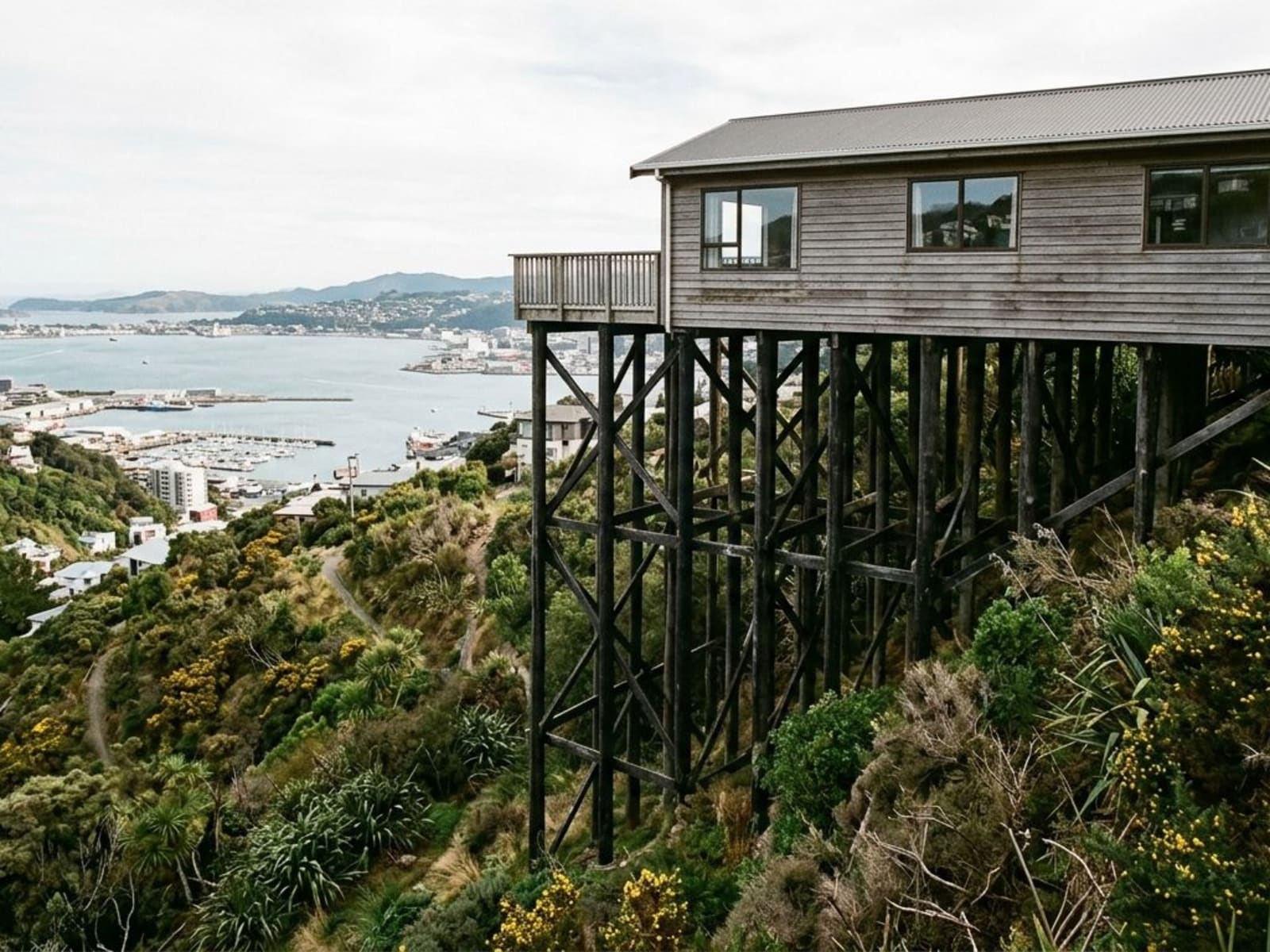 Downhill elevation of a house standing three storeys above the ground